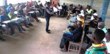 Dr. Julius Monday, WHO Epi-Surveillance/IDSR Team Lead making presentation during the Community Health Volunteers training, Bomi County