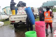 Joint team preparation for distribution of supplies to flood affected victims at a displaced center in Omega community, Monrovia