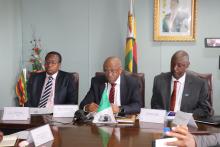 Honorable Minister of Finance and Economic Development; Mr Damoni Kitabire, and Dr Alex Gasasira at the signing ceremony