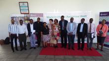 Officials in a group photo during the AMR symposium