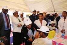 Dr Lia Tadesse vaccinating one of the first 14  year old girls to receive the HPV vaccine nationally.