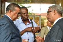 Dr Tedros (left) interacts with Professor Omaswa and Dr Tegegn the WHO Country Representative in Uganda 