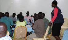 Dr Alice observing the team during the tabletop exercise