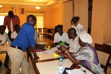 Participants in a practical session on use of the ECD kit.jpg