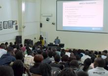 Dr Yonas addresses students and faculty of Makerere University College of Health Sciences