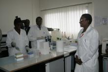 Dr Torimiro observing students work in the lab