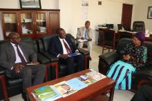 L-R: Mr Alex Chimbaru, former Officer In Charge, Mr Evans Liyosi, new WHO Representative and Hon Nimatulai Bah Chang, Acting Minister of Foreign Affairs and Internationa