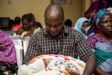 Mr Dennis Shehu and his two-day old son