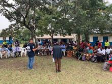 Hon Alok Shama addressing VHTs and community members of Isango sub-county