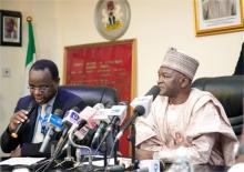 Dr Rex Mpazanje  of WHO (left) and  Minister of Environment, Alhaji Muhammad Mahmood during the Press conference