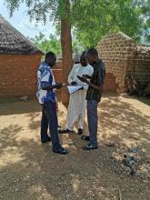 Community volunteer in Cameroon using the AVADAR application to detect cases of acute flaccid paralysis, a clinical symptom of poliomyelitis