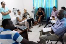 Consultation with Health Care Workers at the Anse Aux Pins Health Centre during Health facility assessment, with WHO NCD Expert Dr Prebo Barango (on the left)  