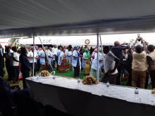 DRC Delegation in a welcome dance with Community Health Workers
