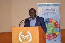 Dr Humphrey Karamagi -SDG coordinator making a presentation
