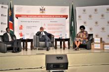 WHO Representative, Dr Charles Sagoe-Moses and  Minister of Health and Social Services, Dr Kalumbi Shangula at the COVID-19 Communication Centre discussing the importance of protecting the health frontliine worker. The session was facilitated by   Public Relations Officer of MoHSS Mrs Manga Libita.