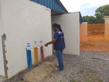 Mr Alex Freeman of WHO monitoring the construction work of the treatment unit