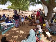 WHO personnel in a sensitization session with community influencers women leaders.jpeg 