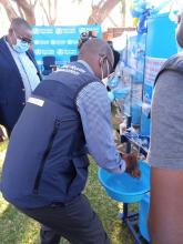The WHO Representative, Dr. Nathan Bakyaita doing a demonstration on handwashing 