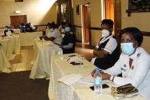 DHMT Management receiving feedback on the preparedness & response of health facilities visited-