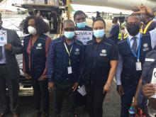 WHO Malawi staff witnessing the arrival of the COVAX Facility COVID 19 vaccines