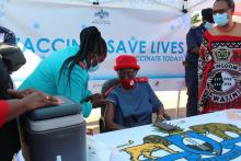 Senior health workers receiving her first dose of the vaccine