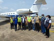 Officials from the Ministry of Health and Sanitation, WHO and J&J at the Lungi International Airport during delivery of the first batch of the vaccine 