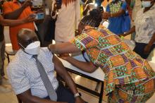 Dr. Peter Clement, WHO Country Representative in Liberia receives COVID-19 vaccine during the launch in Monrovia