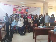 Stakeholders posing for a group photo during the consultative meeting