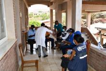 The team meeting the Medical Director at Ghindae Hospital
