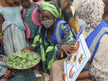 WHO volunteers supporting house-to-house sensitization on cholera