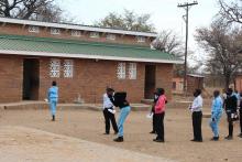 Pantamatenga Primary pupils in a queue to toilets