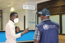 Oteng Kgari, Principal Port Health Technician (left) offering Dr Raphael Marfo an overview of the Tlokweng Boarder Post systems