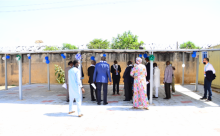 Dr. Walter Kazadi discussing further with the CMD after commissioning of the project.