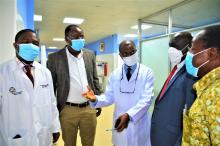 Visiting Nephrologist-Prof. Ejikeme Arodiwe taking WHO Rep. Dr. Clement and team on a tour of the center as he explains the services being offered at the center 