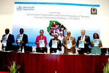 High table officials and the Guest of Honor holding the launched CCS