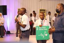 Students describing the Sustainable Development Goals during the ceremony