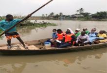 A team of vaccinators crossing into the coastal communities in Lagos State