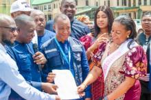 Dr Nonye Soludo taking delivery of medical equipment donated by WHO.jpg