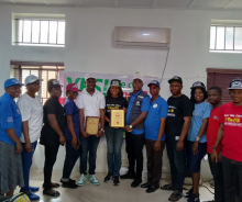 WHO staff with the Osun State MOH TB Programme Manager displaying the two National Awards won by the state.