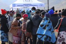 Members of the community queuing to receive free medical screening 