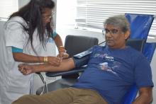 Ajoy Nundoochan, PMO, WHO Mauritius donating blood on 16 June 2023