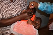 Child getting her vaccine at  Henderson Clinic in Mazowe