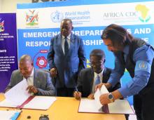 Executive Director of MHSS, Mr Ben Nangombe and WHO Representative, Dr Charles Sagoe-Moses signing the Memorandum of Agreement (MOA) for the SURGE and TASS Project 