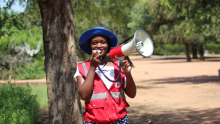 Shekina, a refugee living at Dukwi Refugee Camp, volunteers as a Red Cross Botswana Community Mobiliser to disseminate information about the polio supplementary vaccination campaign at the Camp.