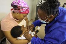 Child being vaccinated during the African Vaccination Week