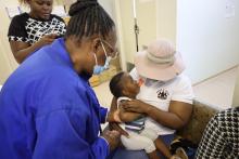 Child being vaccinated during the African Vaccination Week