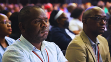 Marcel Kitenge (WHO South Africa) listening attentively at the SAPHC 2023 aimed to reinvigorate the nation's commitment to the Primary Health Care (PHC) approach, emphasizing its significance in achieving Universal Health Coverage (UHC) within the framework of the National Health Insurance (NHI) dispensation.