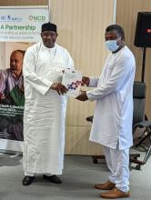 His Excellency President Adama Barrow presented with a copy of the National Multi-Sectoral Strategy and Costed Action Plan by the Health Minister Hon. Dr. Ahmadou Lamin Samateh