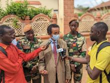 Dr. Desta Tiruneh, WHO Country Representative for The Gambia, answers questions from the media during the event