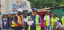 UN Resident Coordinator speaks to the gathering prior to commencement of the clean up exercise